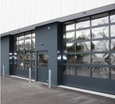 Porte sectionnelle industrielle ALU 40 mm - automatique - repliable en plafond - vitrée - métal - portillon - hydrofuge - hermétique - isolation phonique et thermique_1