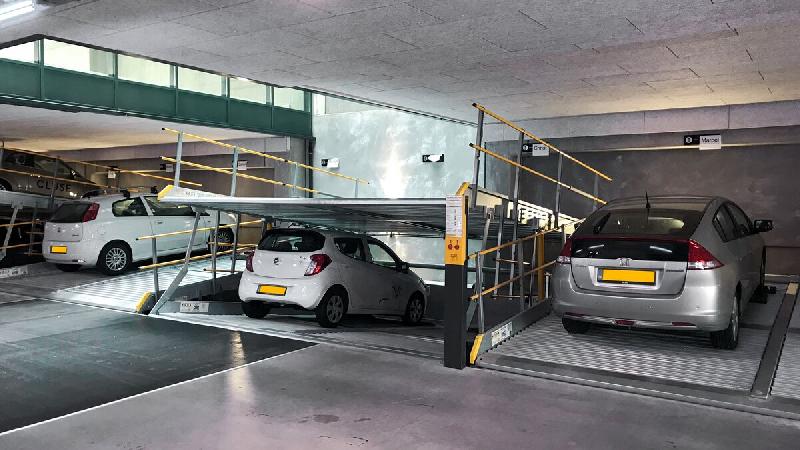 Parking mécanique à plateformes inclinées pour stationnement double niveau, faible profondeur de fosse et hauteur d'installation - Parklift 340_1