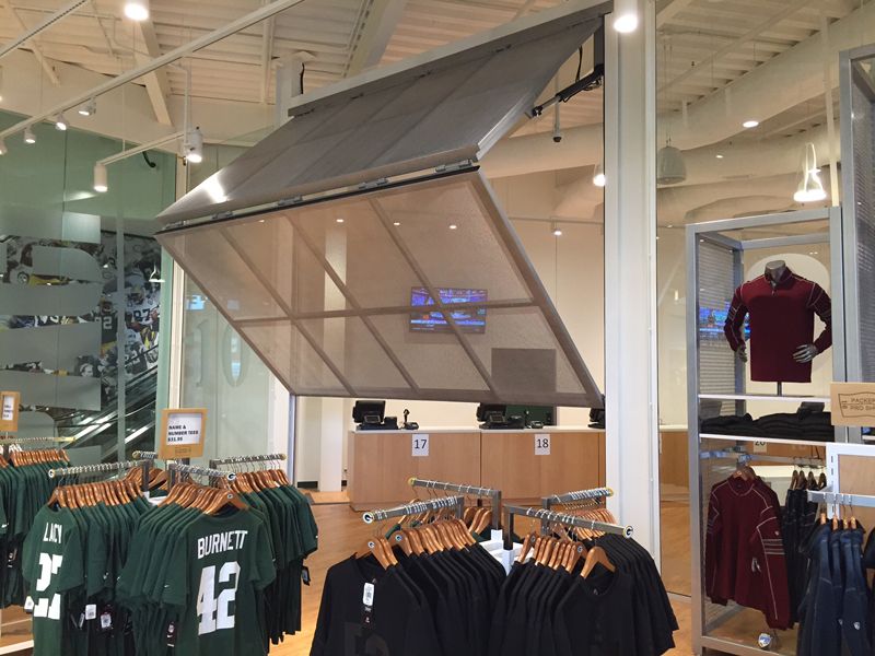 Porte articulée avec ouverture verticale en portefeuille