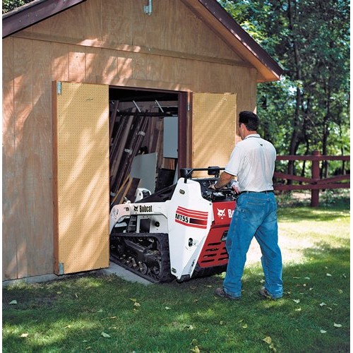 Mini chargeuse sur chenilles - conducteur marchant_1