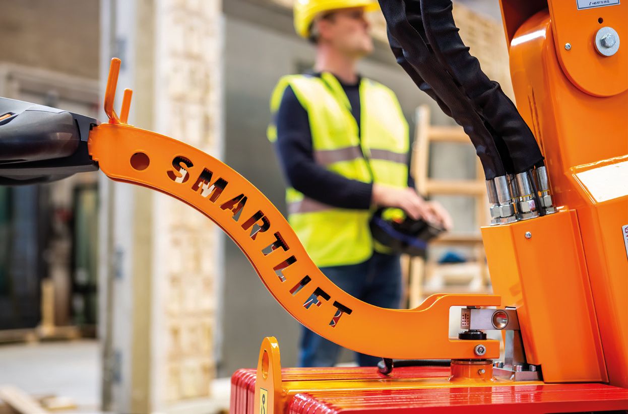 Machine de pose de vitrages lourds avec commande à distance