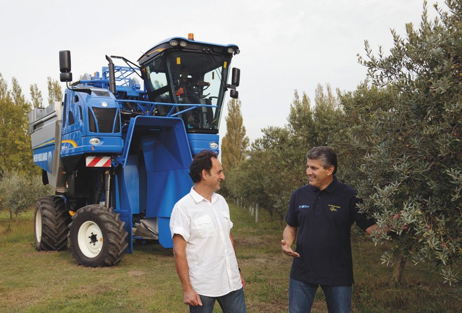 Équipement agricole 9090X Olive New Holland avec bennes en acier inoxydable