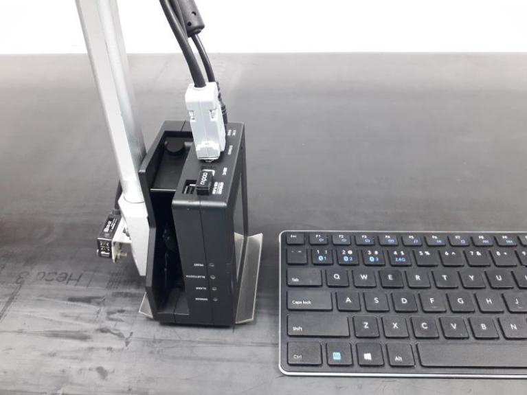 Imprimante sans contact pour surfaces rugueuses