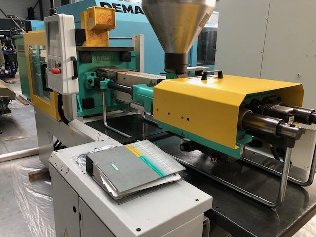 Presse à injection - Volume d'injection 115 cm³ - Pression 1470 bars - Diamètre vis 35 mm - Force de fermeture 500 kN_1