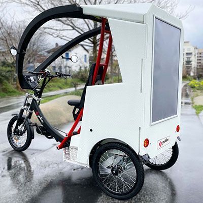 Vélotaxi écologique adapté aux déplacements en centre-ville
