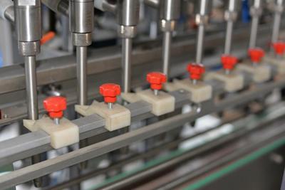 Remplisseuse liquide pour industries pharmaceutiques, cosmétiques et boissons