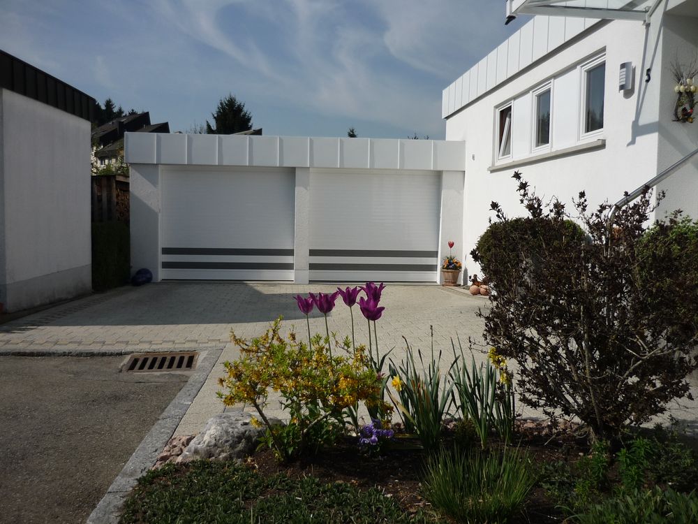 Porte de garage anti-effraction et anti-cambriolage - Ultimium - Certification A2P et normes EN 13241-1_1