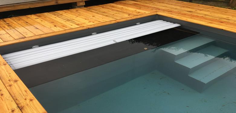 Couverture de sécurité pour piscine - ouverture et fermeture motorisé - Ozeobois_1