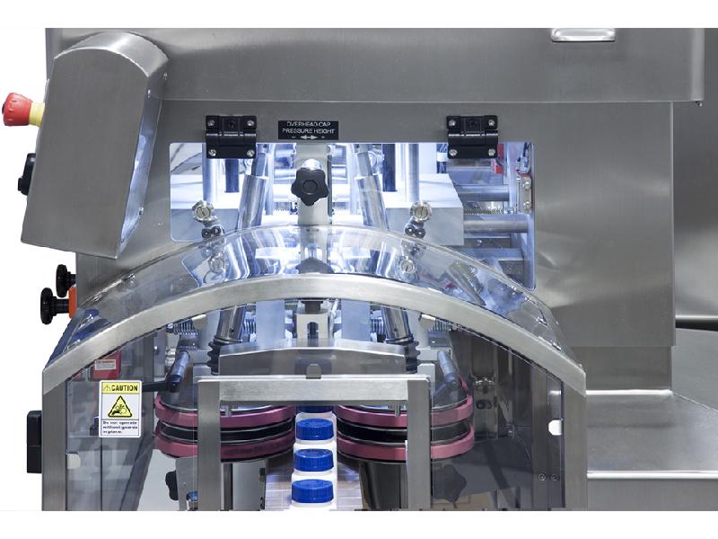 Bt-ic - bouchonneuse en ligne - beltorque® - haute vitesse avec serrage précis et système de courroies synchronisées_1