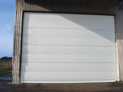 Porte sectionnelle industrielle autoportante - Wst 6 - Dimensions 25m x 10m - Galets sur roulements à billes_1