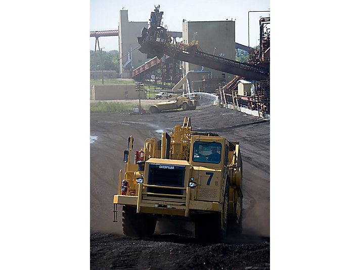 657g - décapeuses à benne ouverte - caterpillar finance france - 33.6 m³_1