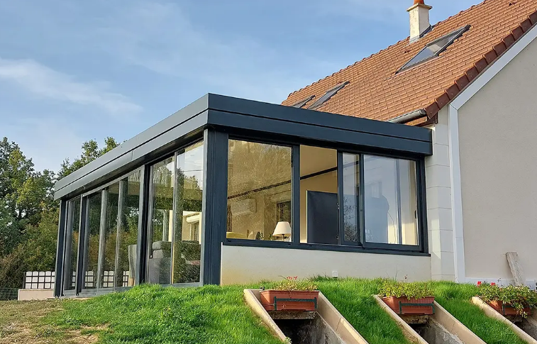 Véranda à toit plat sur-mesure pour extensions de maison - GRI Fabricant_1