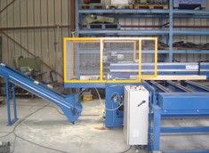 Tronçonneuse industrielle pour palettes avec presseur pneumatique