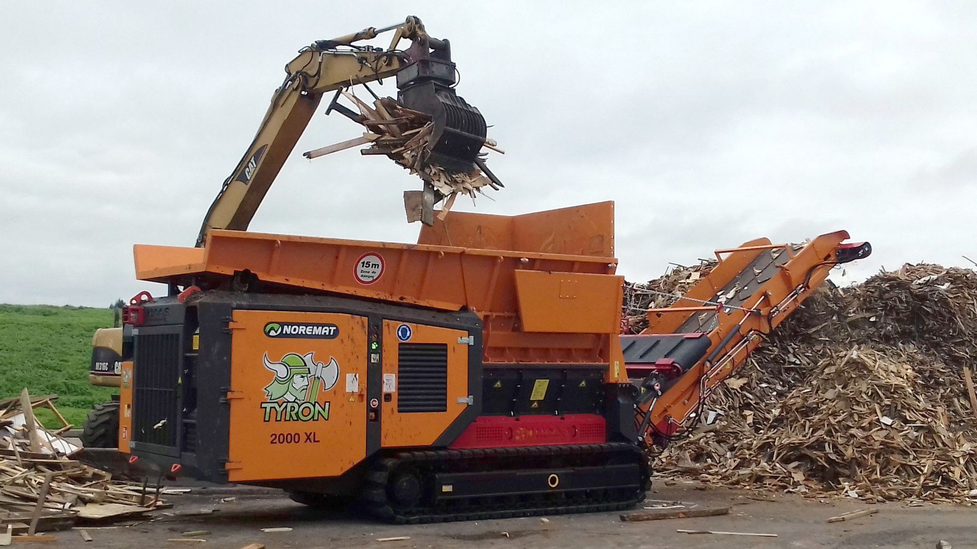 Tyron - broyeur lent bi-rotor pour déchets organiques - Noremat - puissance 294 kW/400 ch_1