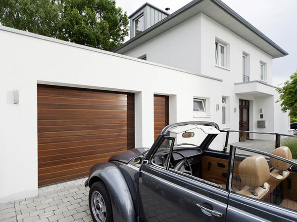 Porte de garage sectionnelle Teckentrup - finition rainurée, 40 mm d'épaisseur - stable et isolée thermiquement_1