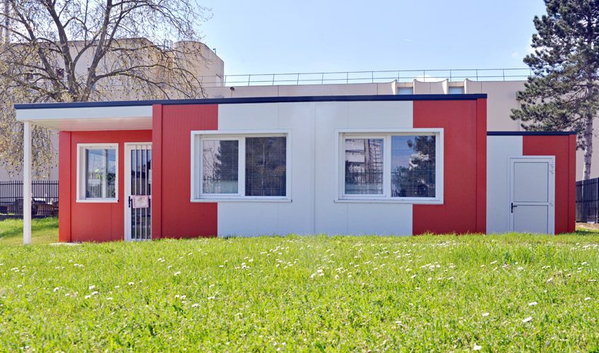 Constructions modulaires - Atemco - 118 m² avec bardage moderne orange et blanc_1