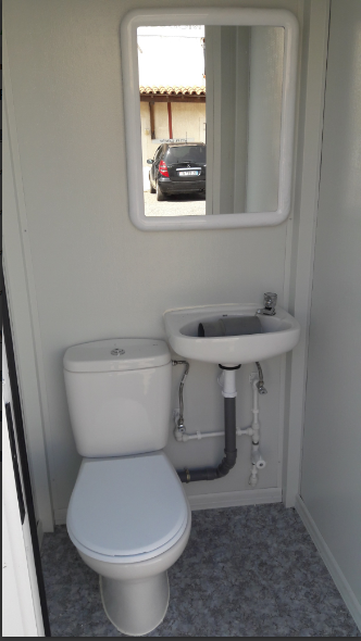 Bungalow de chantier sanitaire neuf 1.19 x 1.19m - REF 703 avec porte, WC, lavabo et luminaire_1