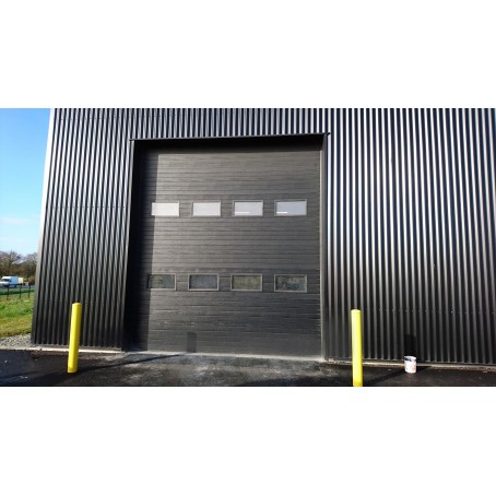 Porte sectionnelle industrielle - Grandes ouvertures - Panneaux isolés et résistants_1