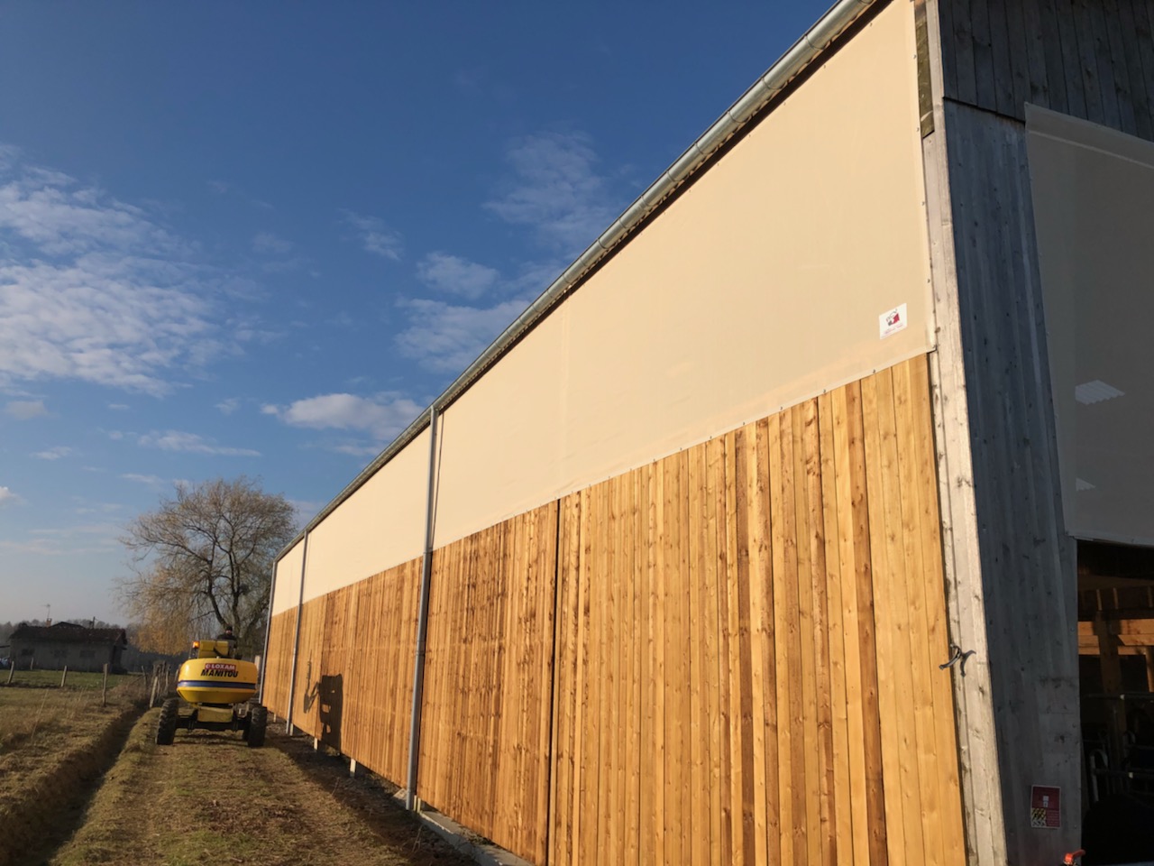 Rideau brise-vent agricole sur mesure motorisé ou manuel