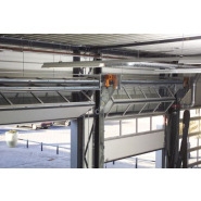 Porte à empilement pour espaces avec contraintes de remontée