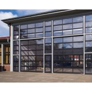 Porte sectionnelle industrielle motorisée en aluminium - ALR F42 Vitraplan et ALR F42 Vitraplan AT - vitrage affleurant pour architecture sophistiquée_1