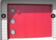 Porte de garage sectionnelle maestro évolution / motorisée / coulissante latérale / avec portillon et hublot / isolation thermique_1