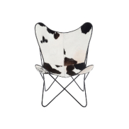 Fauteuil en cuir Loulou - Peau de vache noire et blanche - Design ethnique - Pieds en métal noir_1