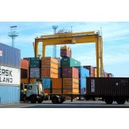 Grue portuaire - Liebherr - Portique de stockage sur pneus avec construction rigide et options de productivité_1