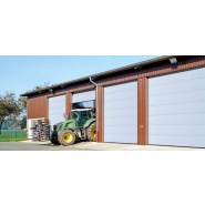 Porte sectionnelle industrielle motorisée - APU F40 Basic - Socle en acier à rainures et vastes vitrages_1