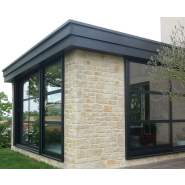 Véranda moderne en aluminium sur mesure - Larges baies vitrées et ouverture panoramique_1