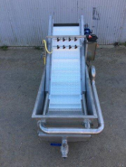 Trémie NC à bain d'eau GM - Occasion - Construction inox avec bouillonneur réglable et tapis à vitesse variable_1