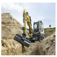 Pelle compacte sur pneus 6T - EW65 - Profondeur de fouille 3895 mm - Gros travaux routiers et aménagements de plateformes - Disponible en location_1