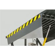 Système de niveleur pour quai de chargement avec mécanisme hydraulique