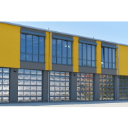 Porte sectionnelle équipée d'une motorisation du type TAS 1/TAS 2 conçues sur mesure pour les casernes de pompiers_1