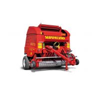 Presse à balles rondes avec ameneur rotatif à peigne