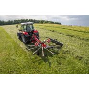 Andaineur Fella Juras 301 DN avec attelage trois-points et chariot de transport