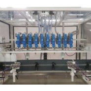 Remplisseuse linéaire  automatique premium Stoppil - jusqu'à 5000 bouteilles/heure - structure en Inox 304L_1