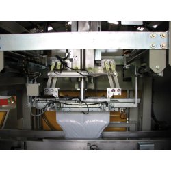 Machines spécifiques - Mise en poche automatique de poussière ou éclat de bois dans des sacs ou filets