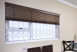 Grille de sécurité repliable Trellidor pour ouvertures