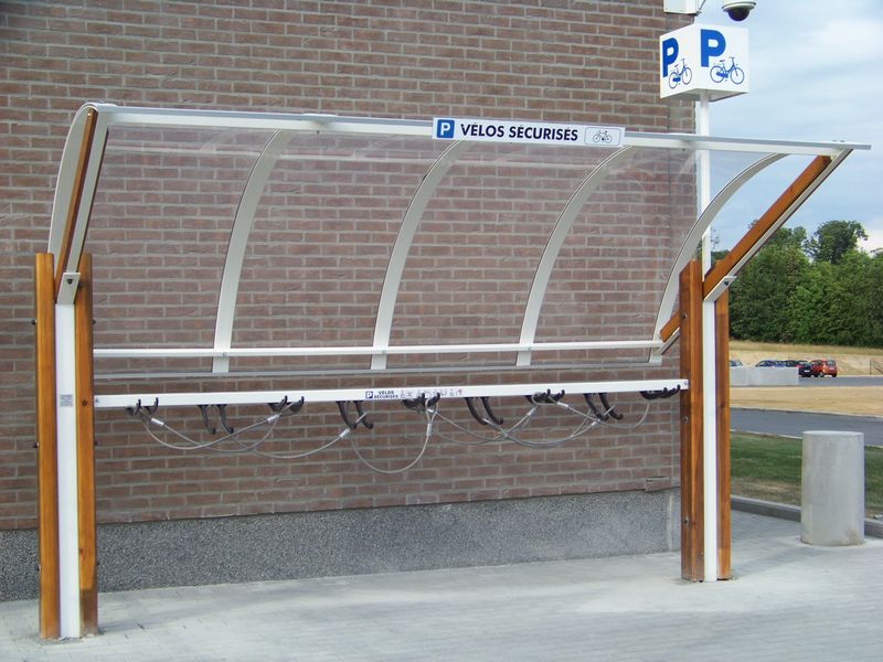 Abri vélo ouvert Clairbois - structure en bois et acier - toiture en plexiglas - 9 vélos - 4 mètres_0