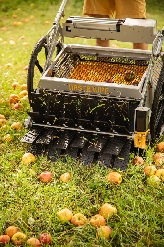 Machine électrique pour ramasser facilement des fruits au sol