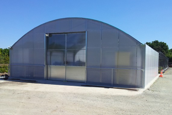 Tente de stockage fermée / structure fixe en acier / couverture unie / porte / bardage métallique / avec fondation_0