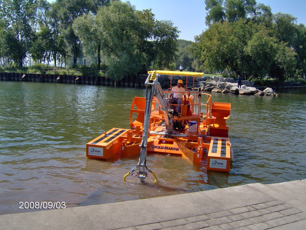 Pelles flottantes pour travaux de dragage_2