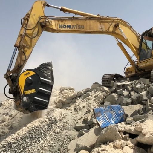 Godet concasseur utilisé pour le recyclage des déchets inertes