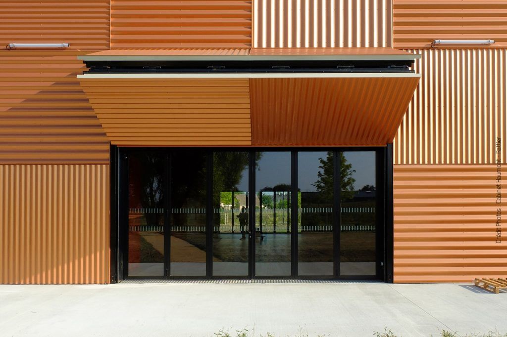 Porte pliante pour grande ouverture sécurisée