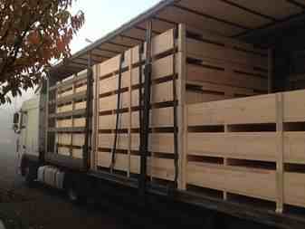 Chalet de Noël pliable en bois - panneaux de 28mm, surface utile de 6,75m², avec comptoirs et porte_2