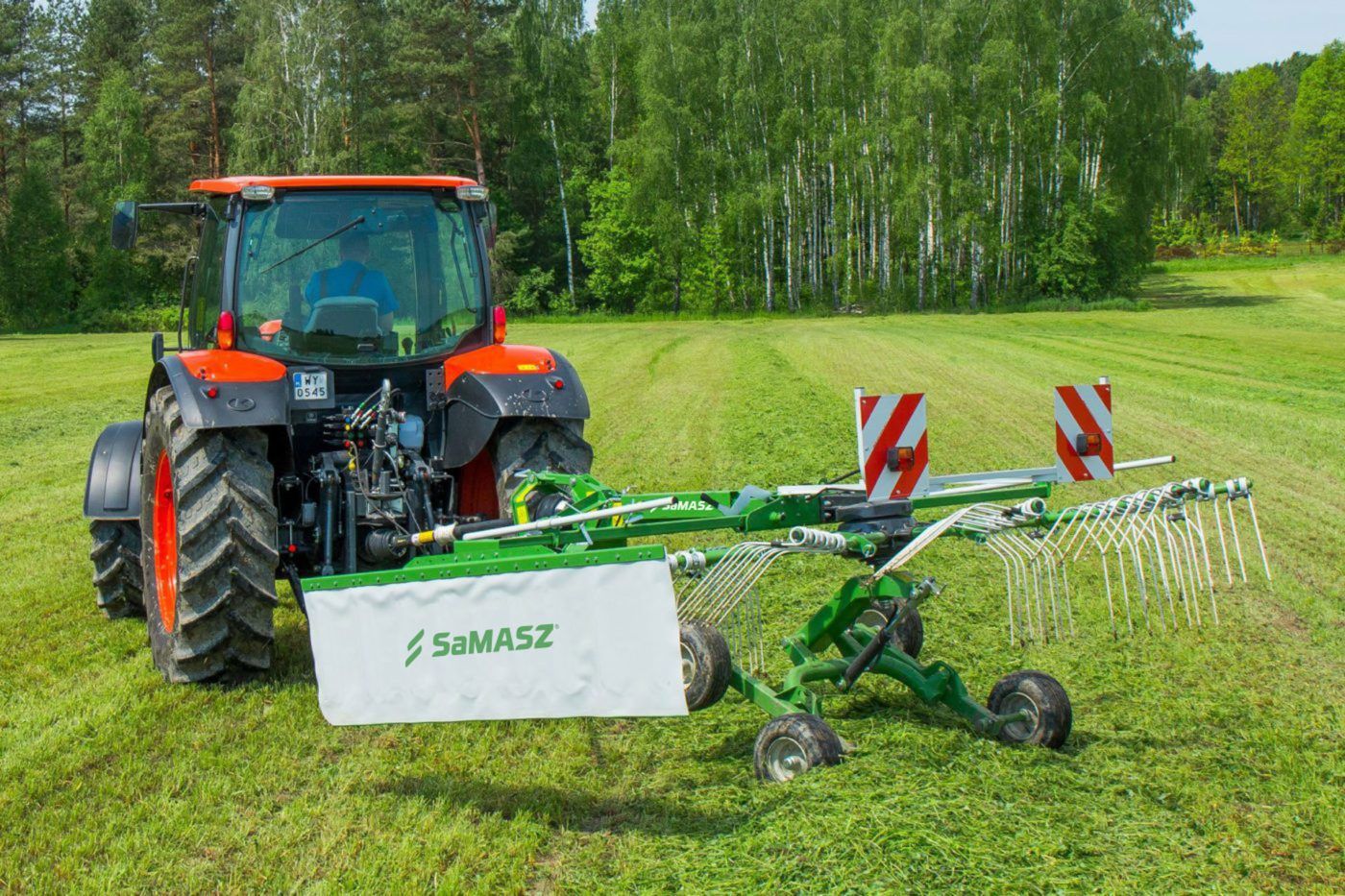 Andaineur Z-350 avec châssis en tandem pour un suivi précis du sol