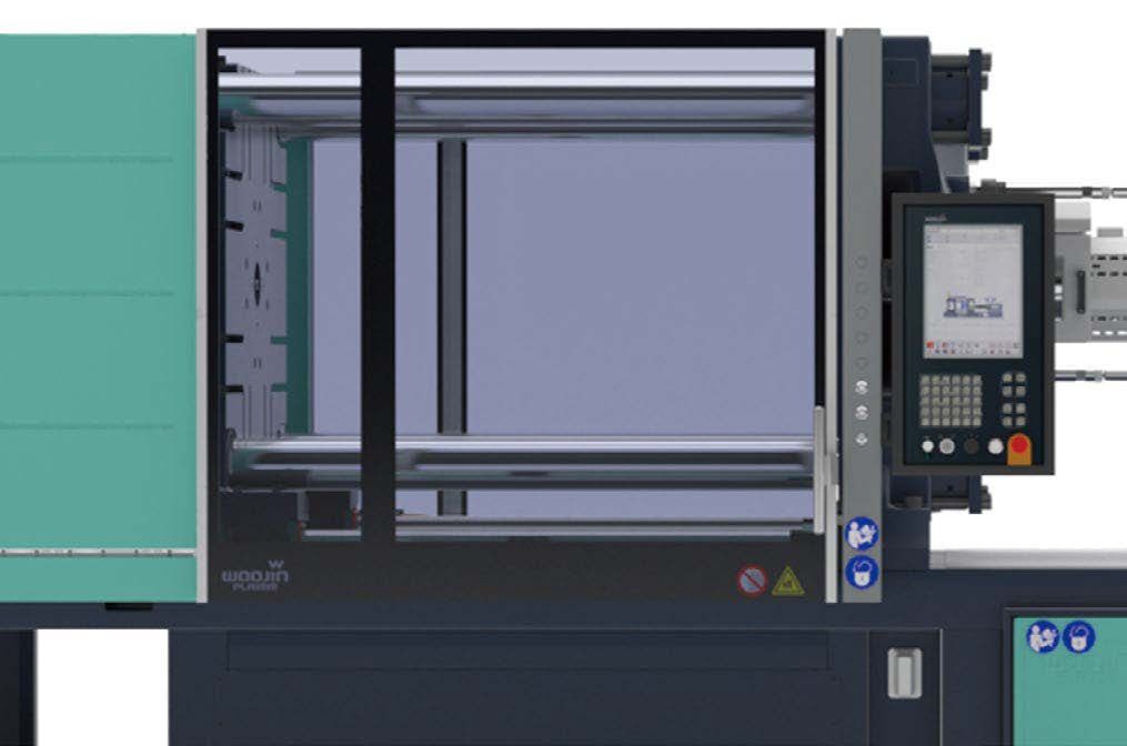 Presse à injecter avec large passage entre colonnes