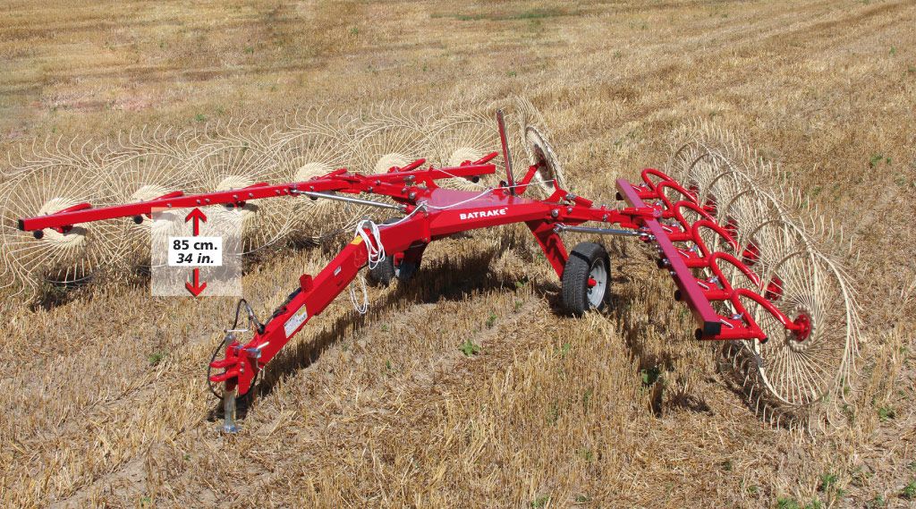 Équipement agricole pour terrains difficiles avec bras indépendants