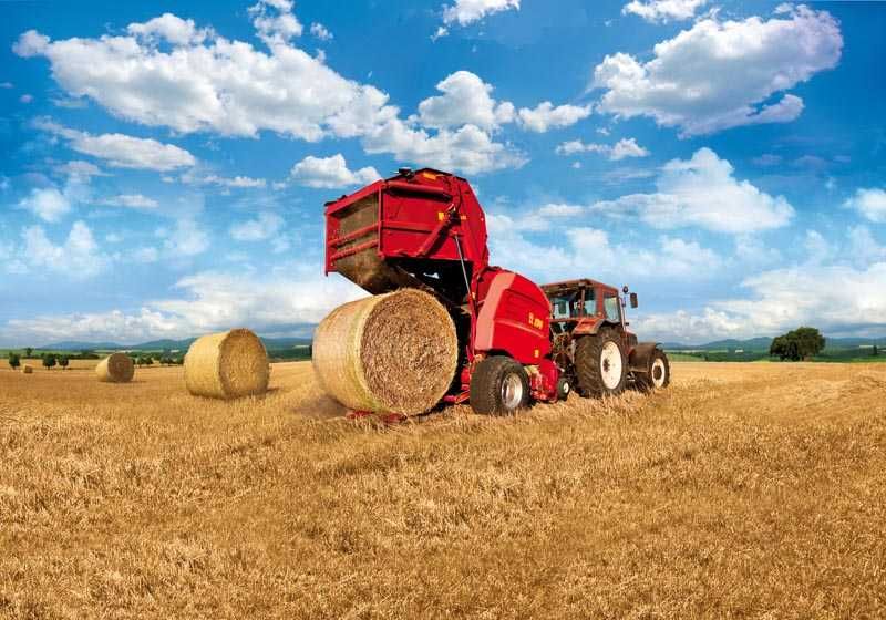 Presse à balles rondes avec relevage hydraulique simple effet